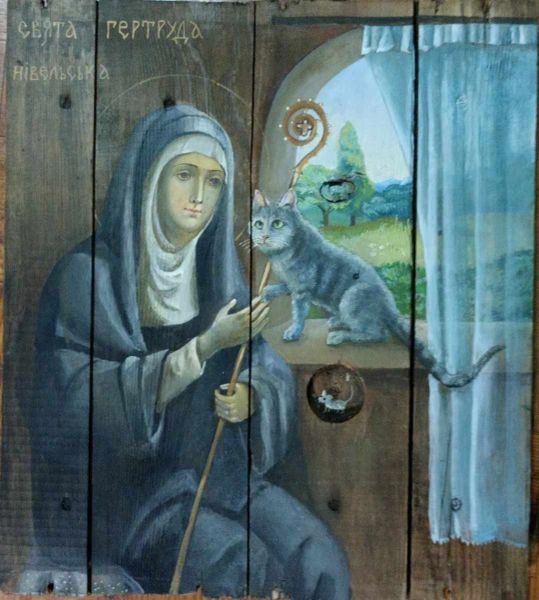 A painting of a woman holding a cat.