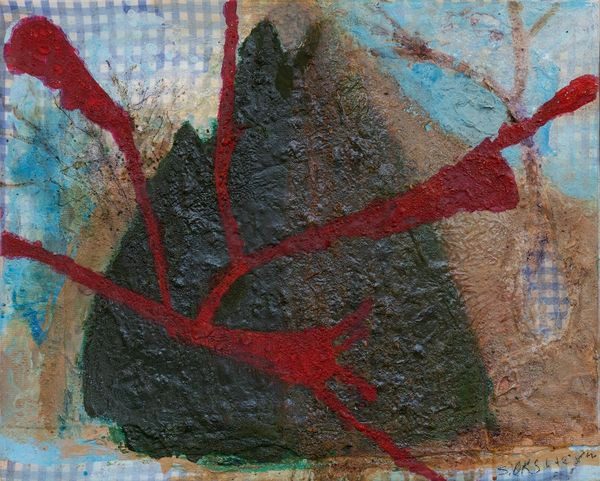 A painting of a rock with red paint on it.