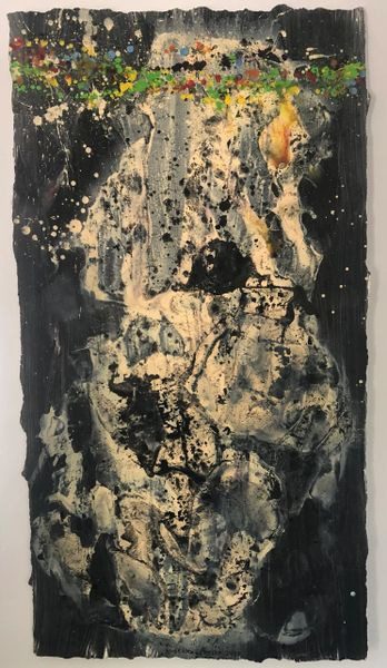 A painting of a black and white abstract with gold accents.