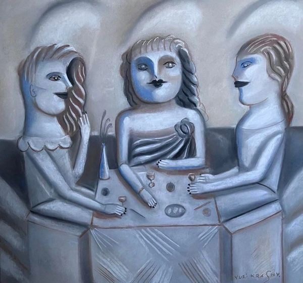 Three women sitting at a table with a wine glass.