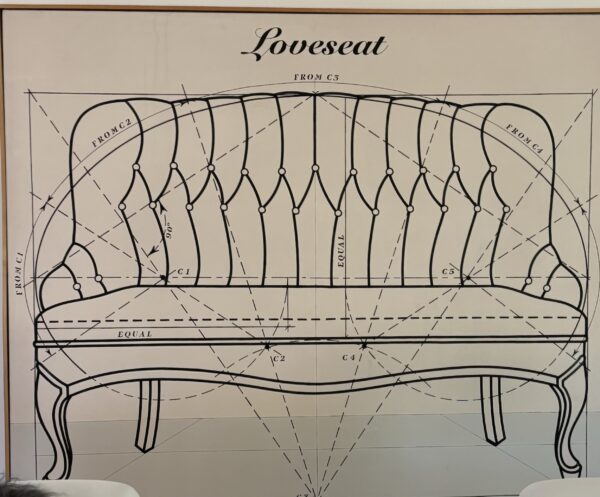 A drawing of loveseat with lines drawn on it.