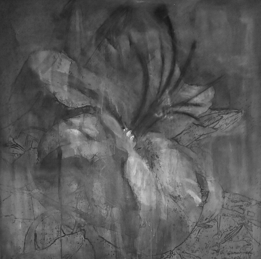 A black and white photo of a flower